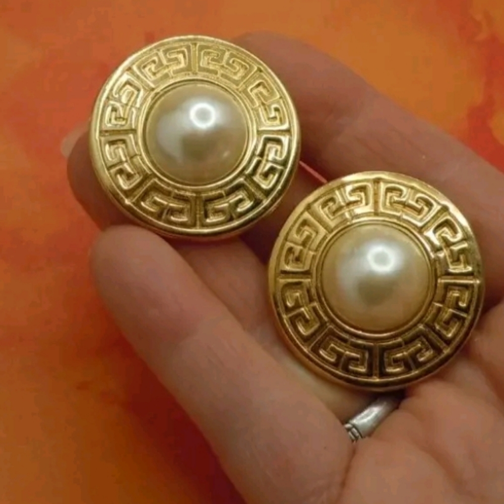 Vintage Givenchy clip on earrings with large faux pearls.